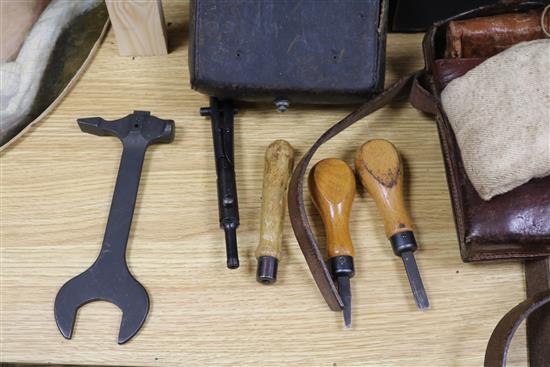 Four leather WWII German machine gun tool kits (complete)